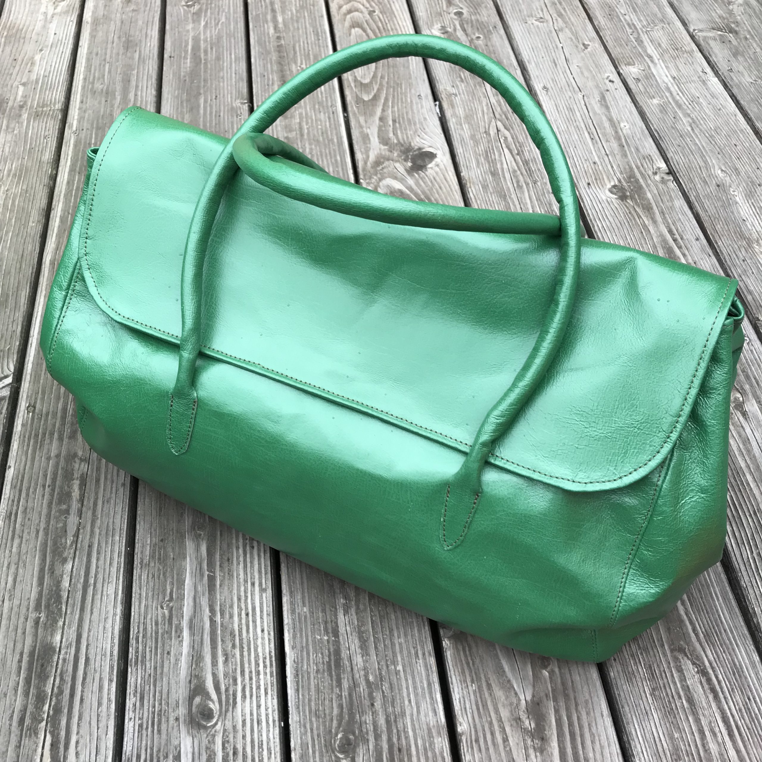Reisetasche aus grünem Schweinsleder